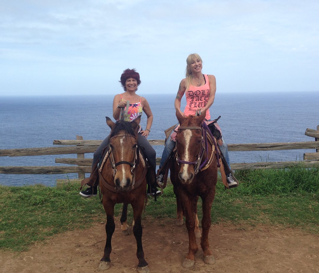 Linda and Sage horseback riding in Maui